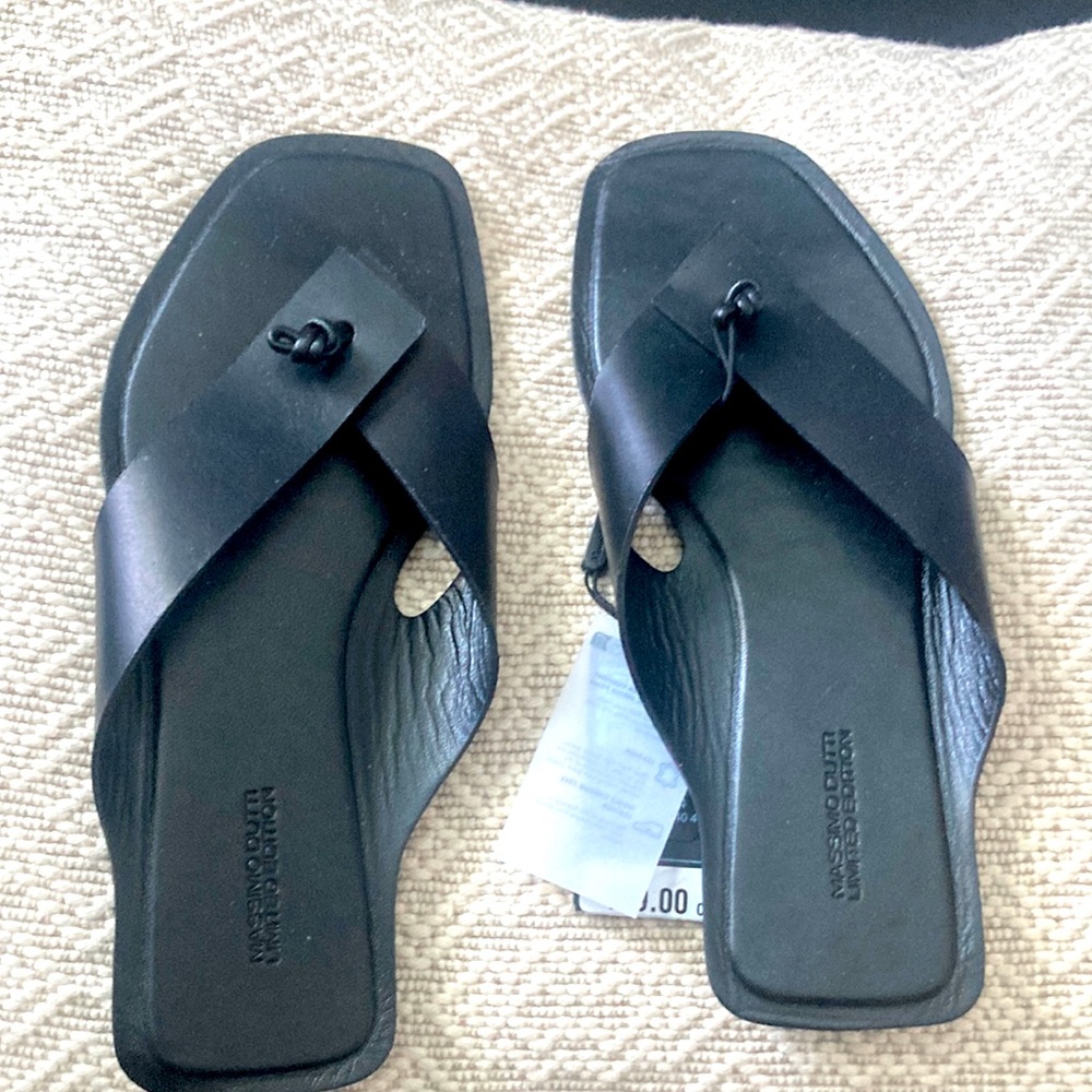 Beautiful black flip flops.